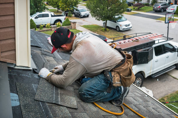 Professional Gutter Repair And Installation technician working in Russellville, AR